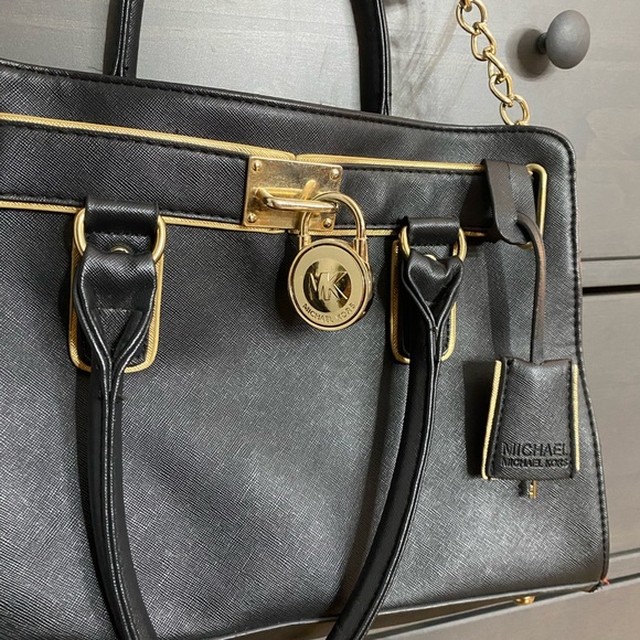 MK Boutique Gold and Black Satchel with Elegant Hardware - Picture 2 of 4